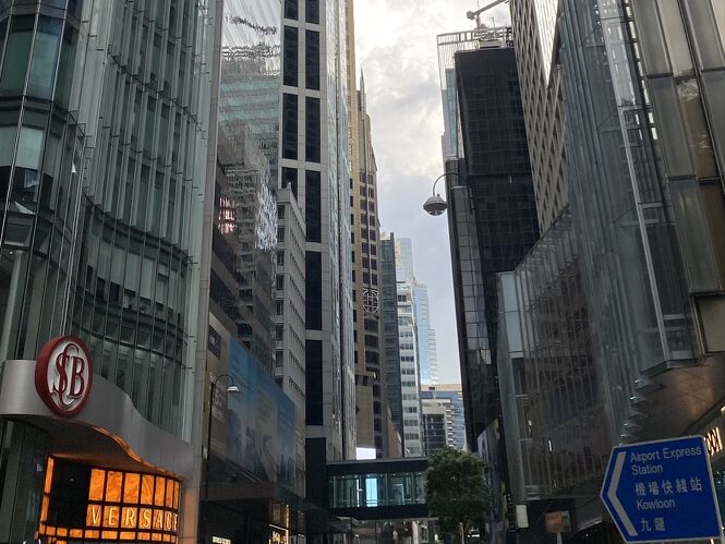 Where to Stay in Hong Kong for Solo Travelers (Best Areas to Meet People) Modern skyscrapers in Central Hong Kong financial district